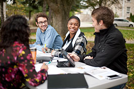 Students studying on campus. Link to What to Give