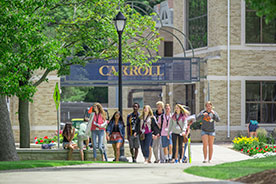 Students walking on campus. Link to Gifts of Real Estate